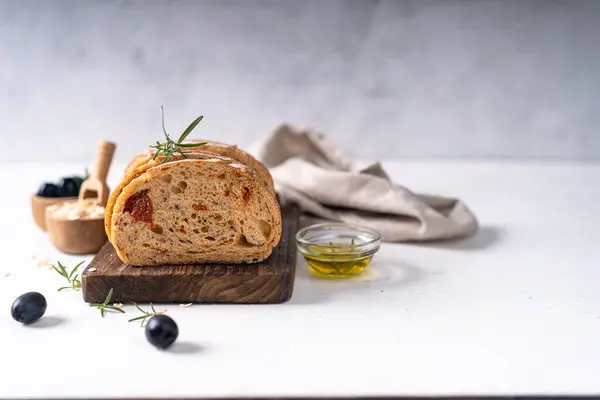 Homemade Sourdough Ciabatta Slice Bread Olives Rosemary White Abstract Table — Stock Photo, Image