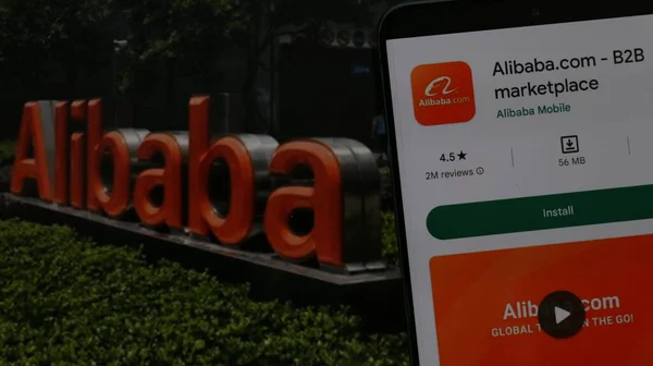 stock image Alibaba.com logo and alibaba office in the background. 