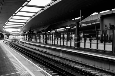 Train station with railway line stretching into the distance