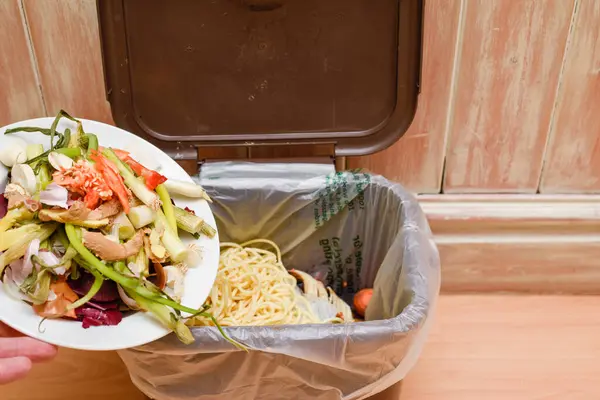 stock image Food waste in a kitchen leftover vegetables can be composted and disposed of in an eco friendly way