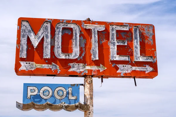 Vintage red, dilapidated Motel sign in Arizona desert on Route 66. High quality photo