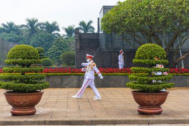 Changing of the guard in front of the Ho Chi Minh Mausoleum clipart