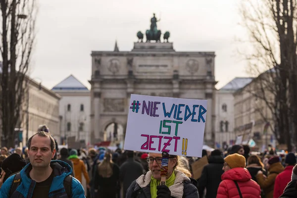 stock image People holding banners against the right wing party AfD at a manifastation in Munich, Germany.