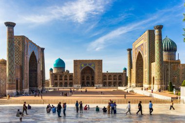 Registan square with three madrasahs and tourists on the observation platform clipart