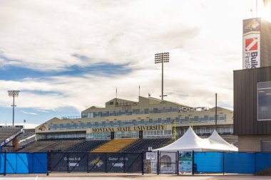 View of the Bobcat Stadium on the campus of Montana State University in Bozeman, home of the Bobcats. MSU is a public research and teaching university. clipart