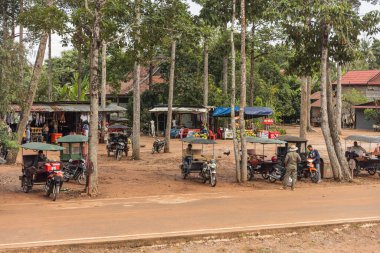 Street food and souvenir vendors at Angkor Wat