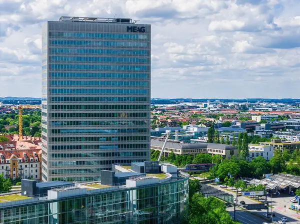 Aerial view of the MEAG high-rise building in Munich, showcasing modern corporate architecture and its urban surroundings.