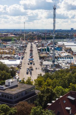 Oktoberfest grounds temporarily shut down after a bomb threat, with police presence and closed festival area.