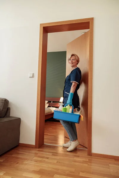 Professional Cleaning Lady Holds Box Detergents Rags Looking Camera High — Stock Photo, Image