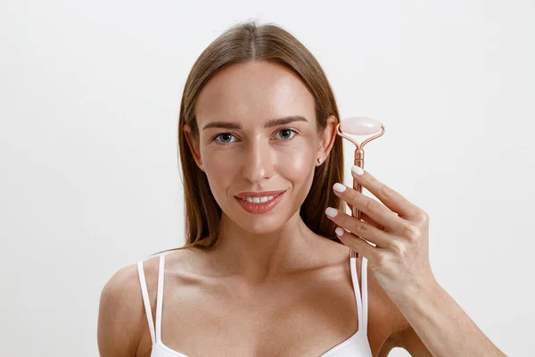 Beautiful Woman Wearing Lingerie Using Stone Facial Roller Beauty Skin — Stock Photo, Image