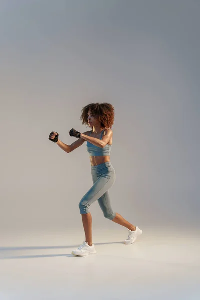 Athletic Active Woman Jumping Studio Background Dynamic Movement — 图库照片