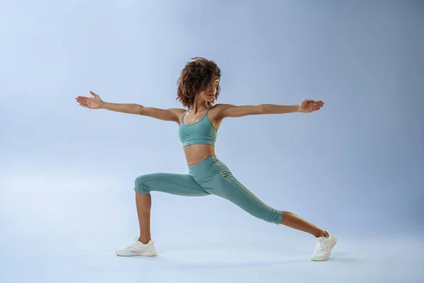 stock image Woman practicing yoga on studio background. Healthy lifestyle concept. High quality photo