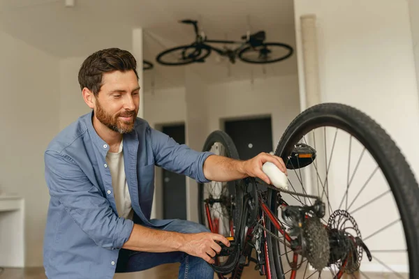 Handsome Smiling Man Casual Clothing Repairing Bicycle Itself Home High — Stock Photo, Image
