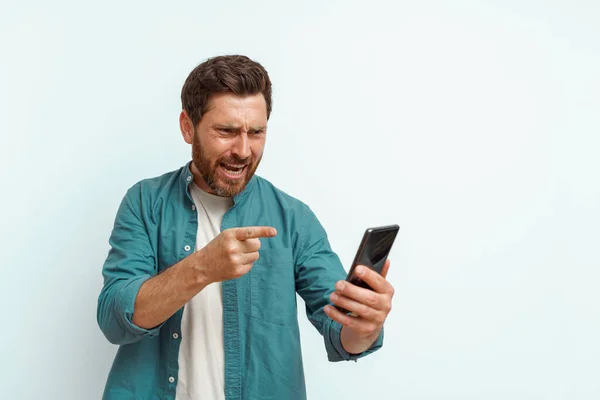 Man Pointing His Mobile Phone While Standing White Background High — Stock Photo, Image