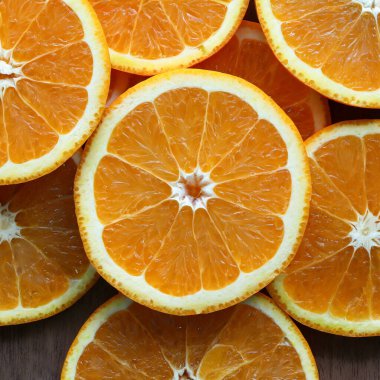 Taze portakal dilimlerinden oluşan tam çerçeve arka plan, yakın plan, yüksek açı görünümü