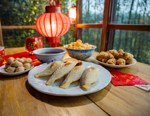 Chinese style festive atmosphere, wooden dining table, various snacks, pastries, lanterns, gifts, red envelopes, Chinese food, dumplings