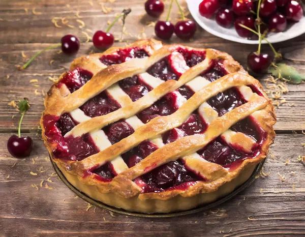 Recently baked cherry pie with a lattice top crust.