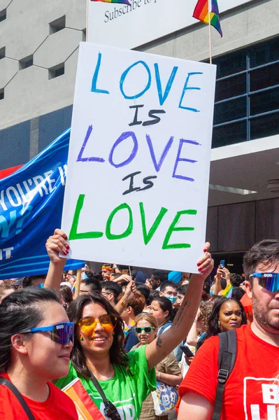 stock image Toronto, ON, Canada  June 26, 2022: Participants hold the banners during the 2022 Annual Pride Parade of Pride Month in Toronto Downtown.