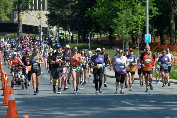 stock image Toronto, ON, Canada - June 22, 2019: Runner takes part in amateur sports run competition during the Pride month in Toronto