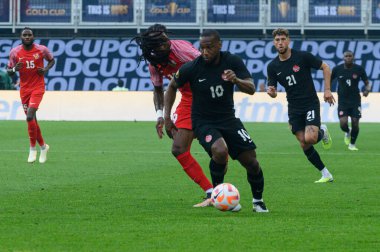 Toronto, ON, Kanada - 27 Haziran 2023: Junior Hoilett # 10, Kanada milli takımı ile Guadeloupe arasındaki 2023 Concacaf Gold Cup maçı sırasında top ile hareket etti (Skor 2: 2: 2)
