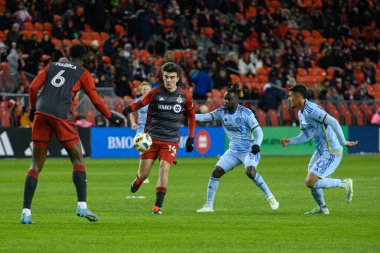 Toronto, ON, Kanada -23 Mart 2024: Alonso Coello # 14 Toronto FC orta saha oyuncusu Toronto FC (Kanada) ve Atlanta United (ABD) arasında oynanan MLS Normal Sezonu maçında topla hareket ediyor (Score 2: 0))