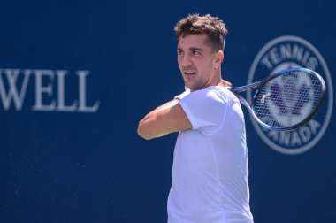 Toronto, ON, Canada - August 7, 2023: Thanasi Kokkinakis (AUS) plays against Constant Lestienne (FR) during the qualifying match of the National Bank Open at Sobeys Stadium in Toronto clipart