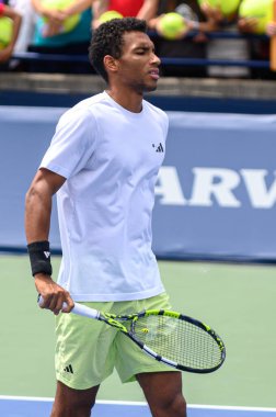 Toronto, ON, Canada - August 5, 2023:  Felix Auger-Aliassime (Canada) on a court during the training session at of the National Bank Open at Sobeys Stadium in Toronto clipart