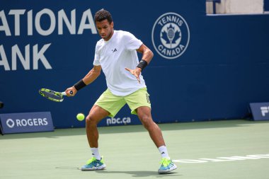 Toronto, ON, Canada - August 5, 2023:  Felix Auger-Aliassime (Canada) on a court during the training session at of the National Bank Open at Sobeys Stadium in Toronto clipart