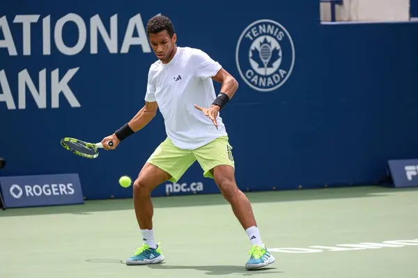 stock image Toronto, ON, Canada - August 5, 2023:  Felix Auger-Aliassime (Canada) on a court during the training session at of the National Bank Open at Sobeys Stadium in Toronto