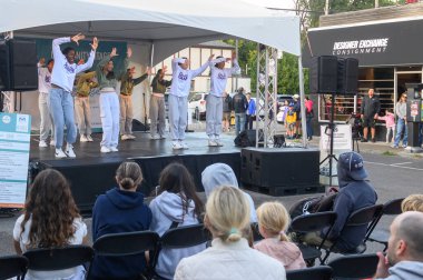 Toronto, ON, Canada - September 7, 2024: Children perform on stage during the annual street festival Taste of The Kingsway 2024 clipart