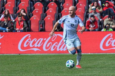 Toronto, ON, Kanada - 15 Mart 2025: Chicago İtfaiye FC 'nin 15 numaralı savunucusu BMO Field' da Toronto FC 'ye karşı oynanan maçta topu kontrol ediyor. Sayı 1: 2, Chicago İtfaiyesi kazandı.)