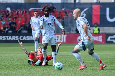 Toronto, ON, Kanada - 15 Mart 2025: Andrew Gutman # 15 Chicago Fire FC savunucusu BMO Field 'da Toronto FC-Chicago Fire FC arasında oynanan maçta topla hareket etti (1: 2 Chicago Fire FC kazandı))
