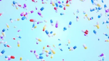 Hareketli Canlı Kapsüller: Mavi zemin üzerinde yüzen renkli hapların büyüleyici bir 3 boyutlu animasyonu, Modern Tıp ve Sağlık hizmetlerinin özünü yakalıyor.