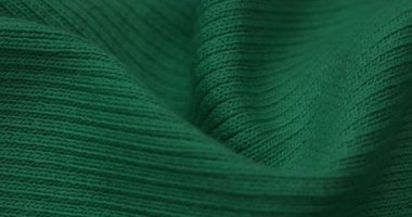 Yeşil kumaş arkaplan, yakın plan.