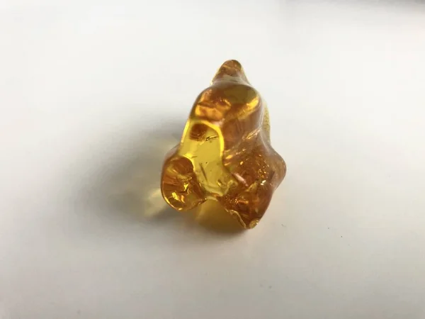 stock image Polished nugget of Baltic amber found in Kolobrzeg, Poland.