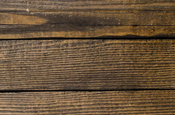 The texture of old, brown pine boards. Hard, old wood. 04.20.2023 Koszalin, Poland.