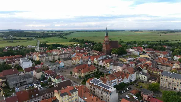 Stock image Trzebiatow's historic core, marked by its impressive Gothic church with a towering spire.