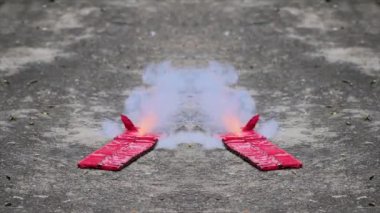 Close up of a dual effect hundred walla exploding out 