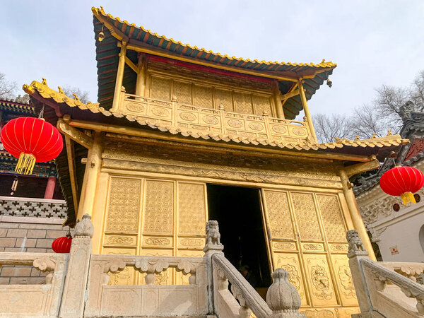 A Chinese temple with golden in Wutai Mountain