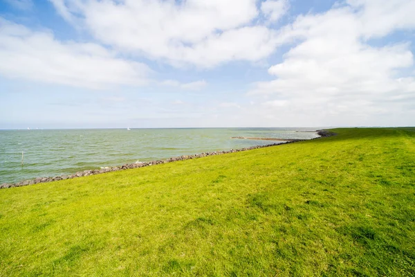 stock image A dike of the IJsselmeer in Friesland, the Netherlands