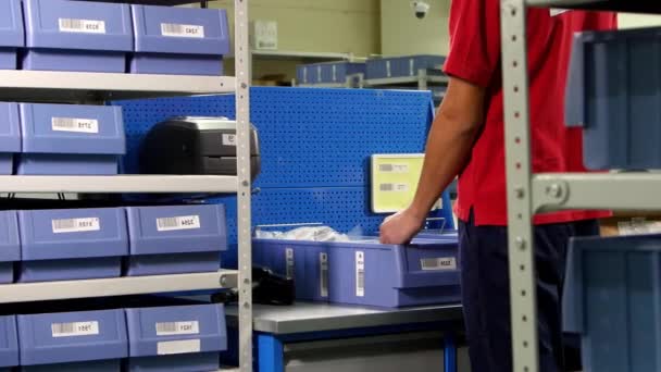 Man Warehouse Worker Work Uniform Checks Goods Box Transfers Them — Stock Video