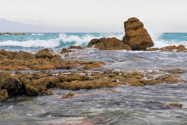 stock image Mediterranean sea, Sabinilla beach, Malaga, rocks next to the shore