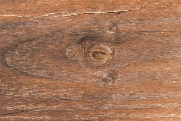 木に亀裂や結び目を持つ古い風化した木材 要旨の背景 — ストック写真