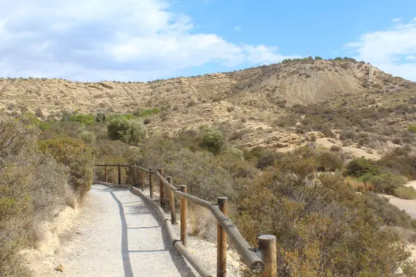 road through a desert landscape.