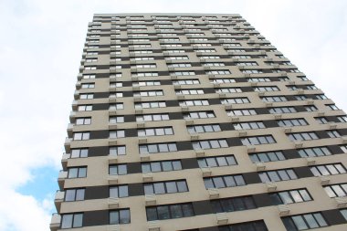 new apartment house with a blue sky