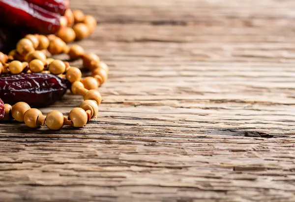 stock image dried dates on wooden background