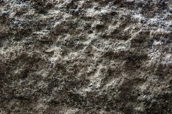 磨石的特写表面 粗浅灰色天然石材的抽象 背景质感 — 图库照片