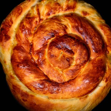 Taze pişmiş çöreğin yakın plan görüntüsü, ev yapımı tatlı, yemek geçmişi, yukarıdan çekilmiş.