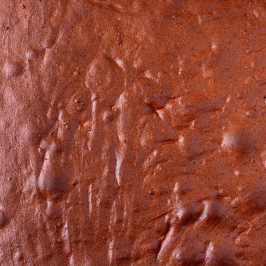 Kek kenarlığı yüzeyi, çikolatalı pastanın en üst tabakası, arka plan dokusu, yukarıdan yakın çekim