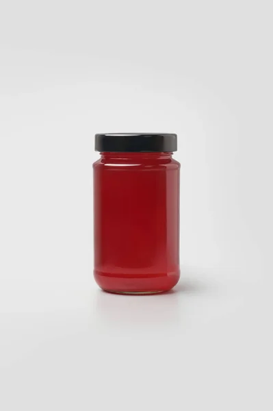 Glazen Pot Met Heldere Rode Jam Fles Met Zwart Deksel — Stockfoto